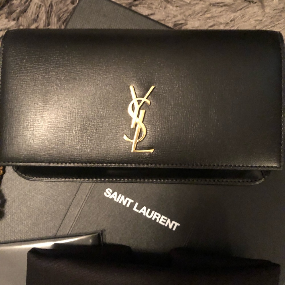 YSL shoulder bag , phone case .